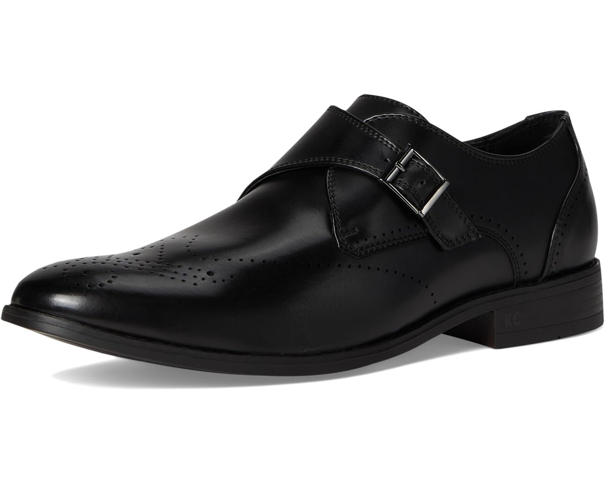Black leather monk strap dress shoe in three-quarter view with perforated toe