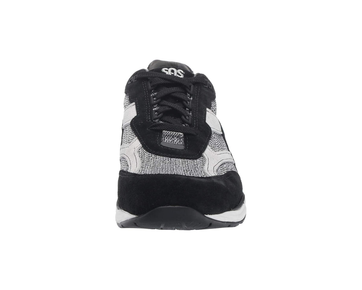 Men's lace-up sneaker toe view with black collar, gray mesh, and white stripe accents