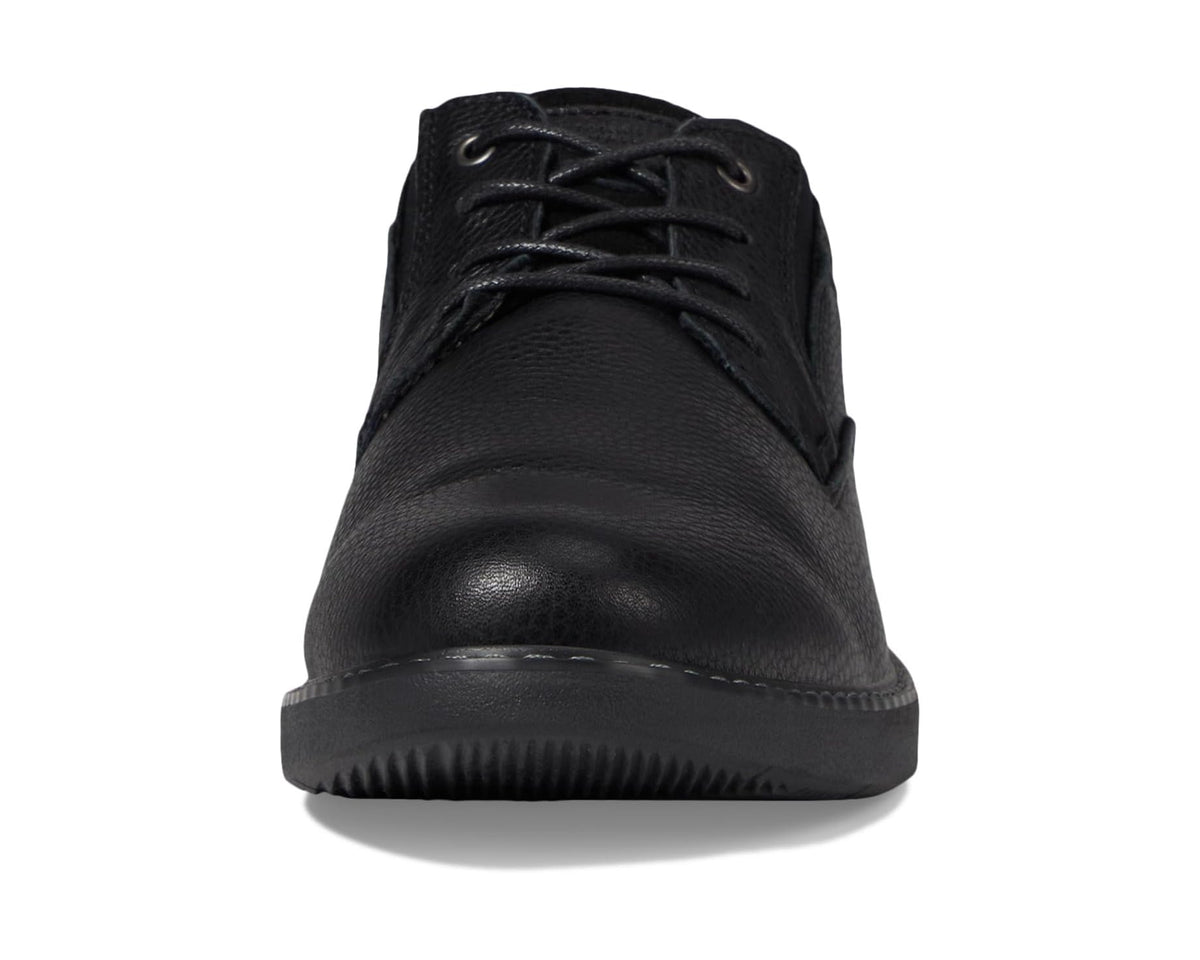 Black lace-up oxford with rounded toe and cushioned tongue