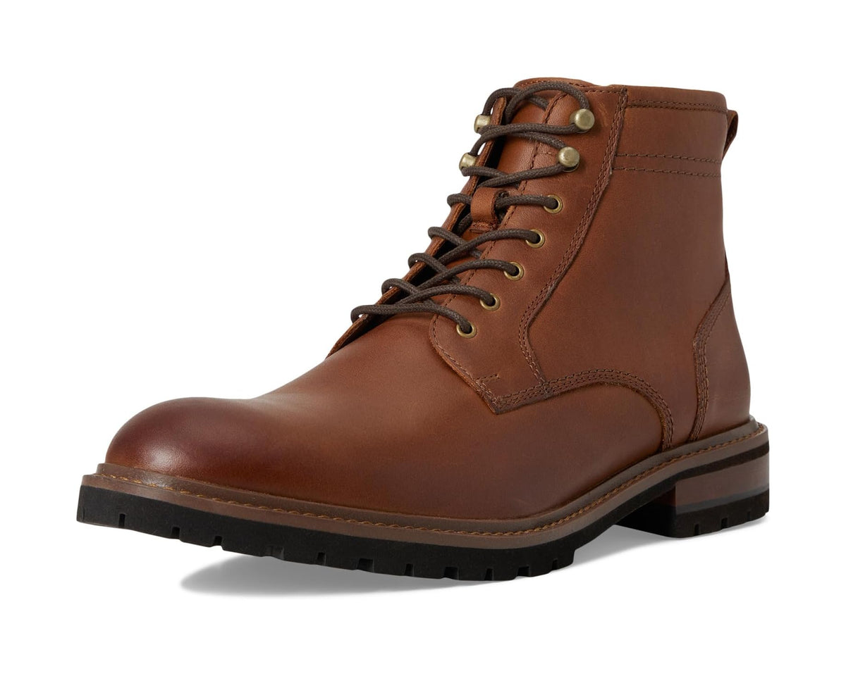 Tan leather lace-up ankle boots with plain toe, round eyelets, and lug sole