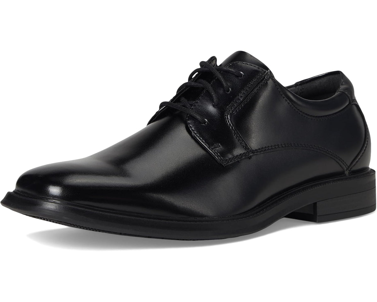 Men's black polished leather lace-up dress shoe, side profile with low heel