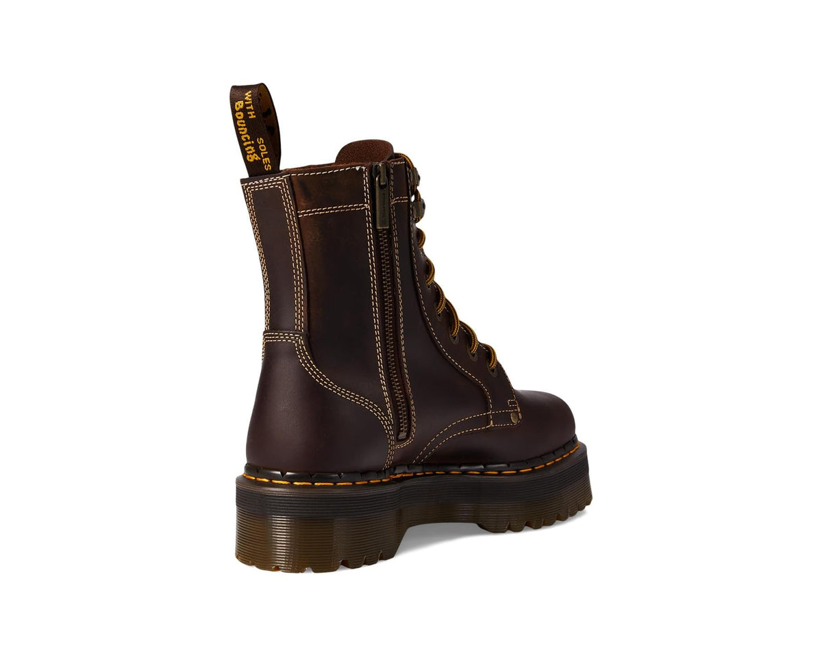 Dark brown leather combat boots with side zipper, yellow stitching, and chunky sole