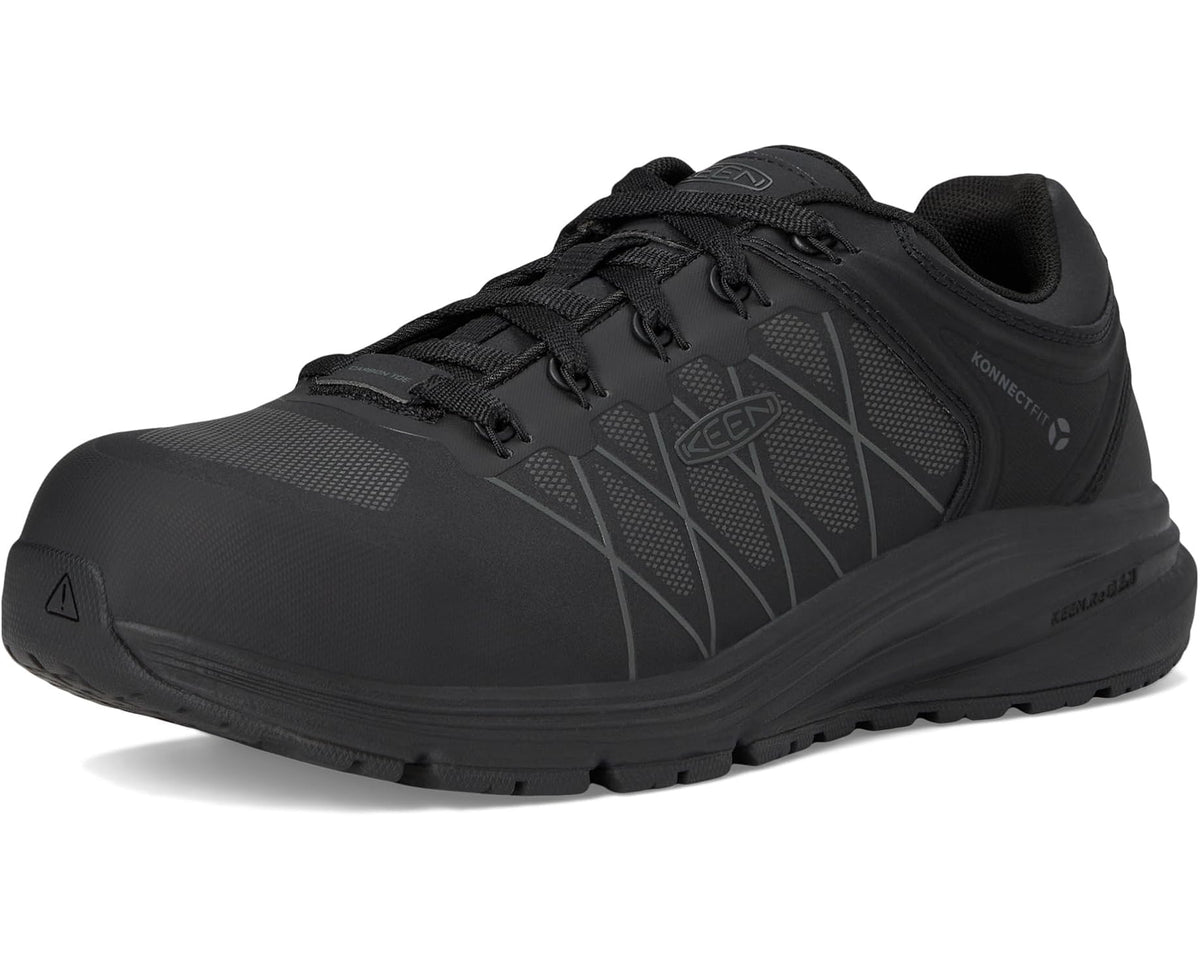 Black work sneaker front 3/4 view with carbon-toe look and rugged outsole
