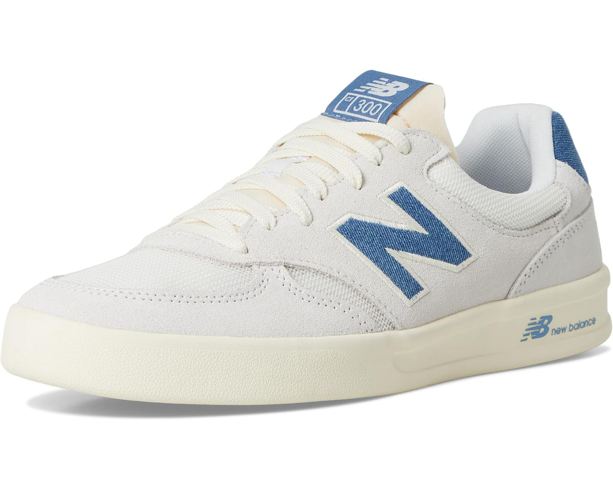 New Balance Classics 300 court sneaker front three-quarter view with blue N and cream midsole