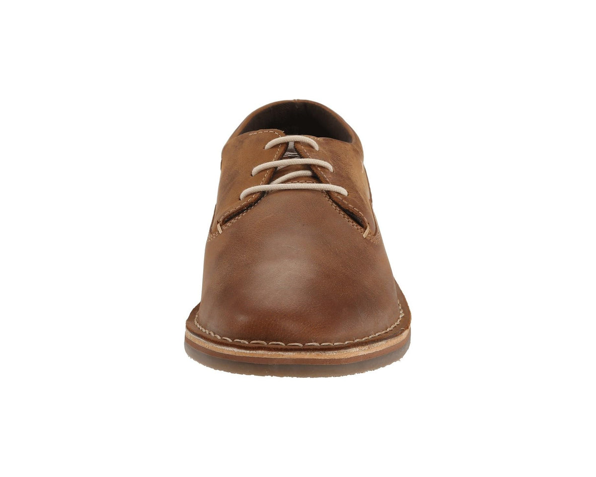 Tan leather lace-up oxford shoe front view with white laces and stitching