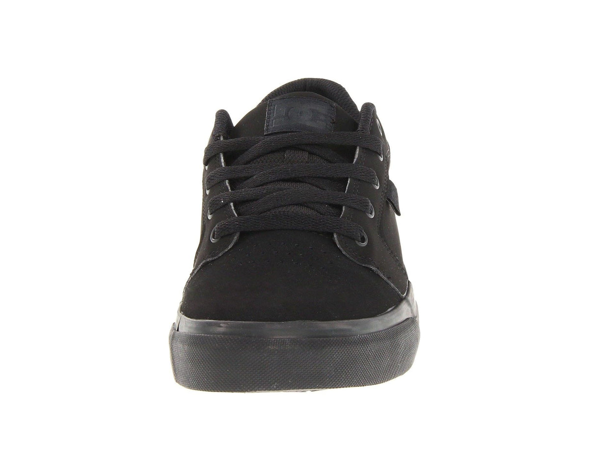 Black low-top sneakers front view with black laces and flat vulcanized sole