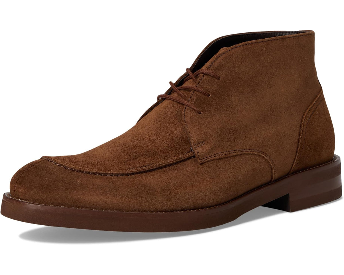 Dark brown suede lace-up chukka boot with moc-style toe and low heel