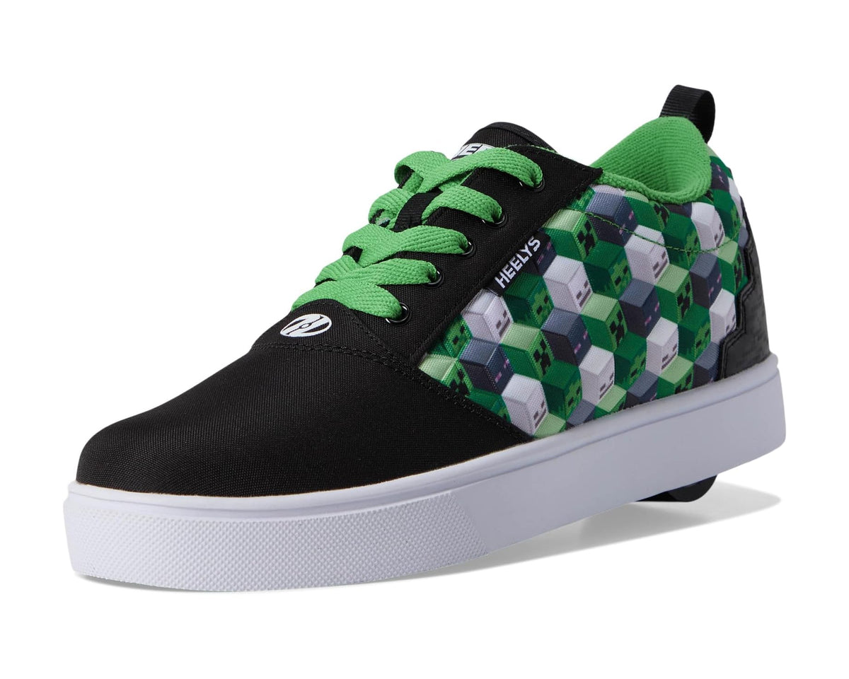 Men's Heelys skate shoe front angle: black upper, green laces, green cube pattern, white sole