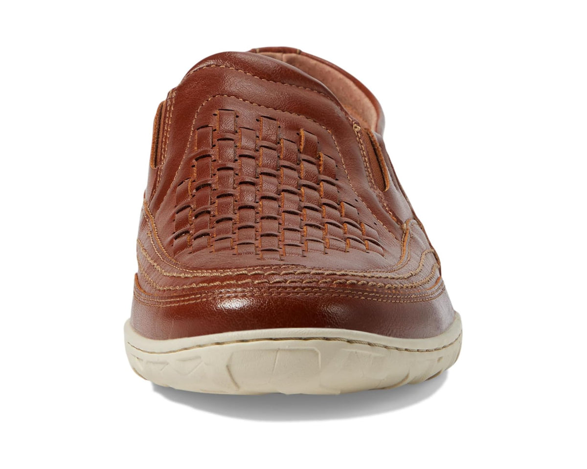 Men's sienna brown slip-on loafer with woven heel panel and cushioned white sole