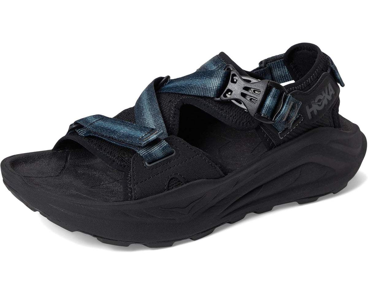 Men's Hoka Infini Hike TC trail sandals, front 3/4 view with black upper and blue straps