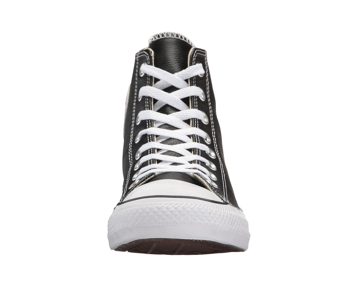 Black high-top sneaker with white laces and white rubber sole front view