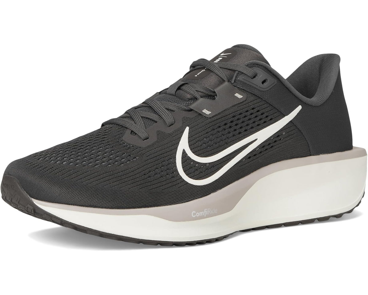 Men's black running shoes 3/4 view, lace-up, white swoosh and midsole.
