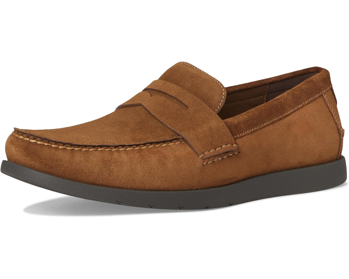Men's brown suede penny loafer side view with penny slot and rubber outsole