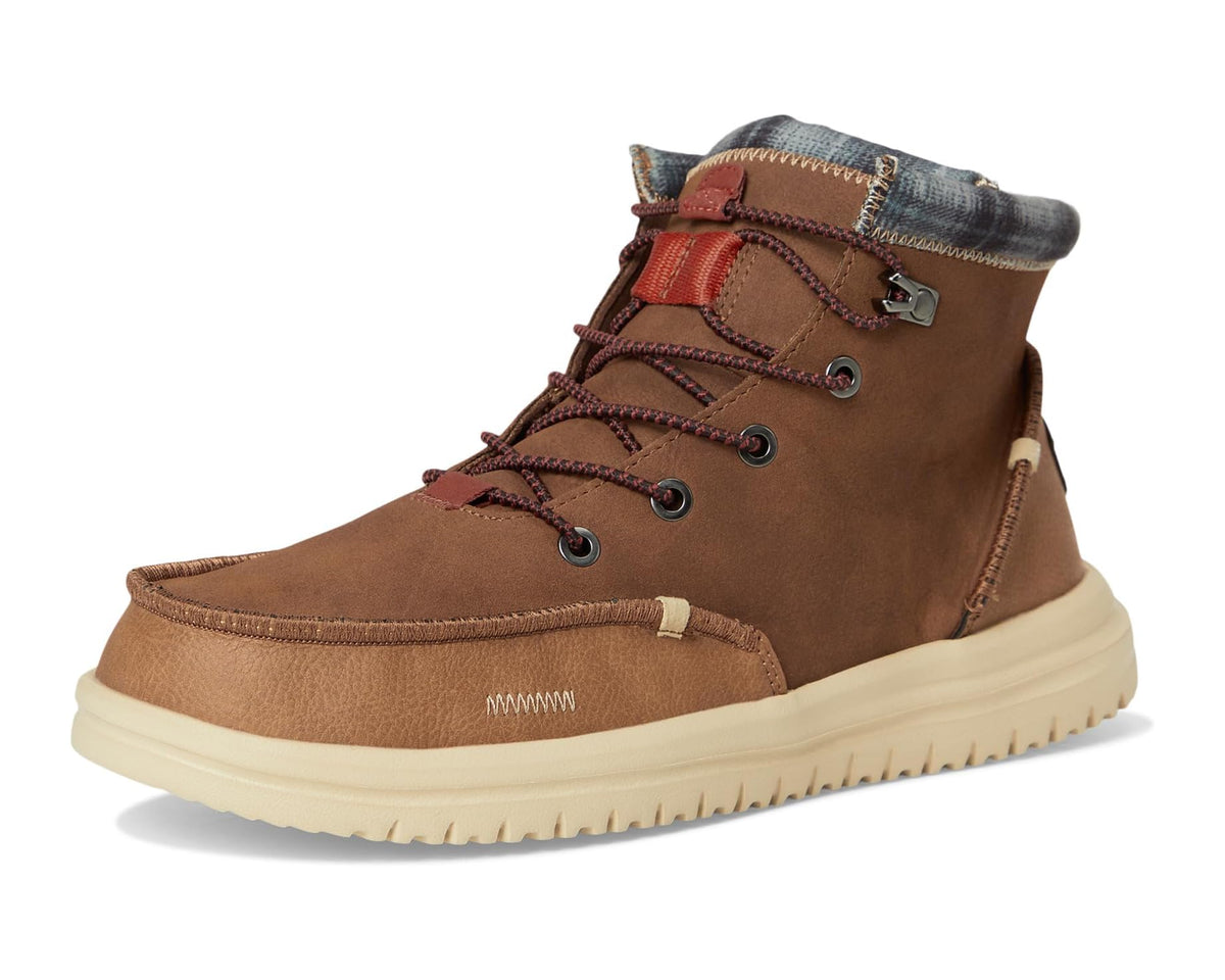 Cognac brown lace-up ankle boot with denim cuff, red lacing, and cushioned off-white sole