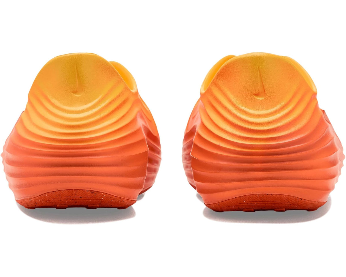 Men's Nike Reactx Rejuven8 slip-on clog heels, orange textured tread underside