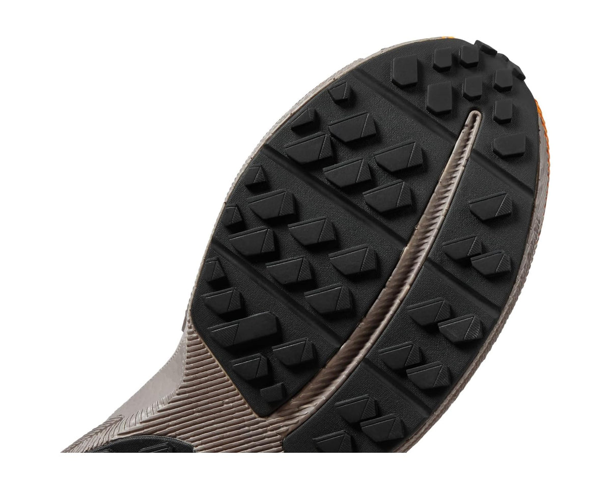 Trail running shoe outsole, black studded rubber tread with gray midsole