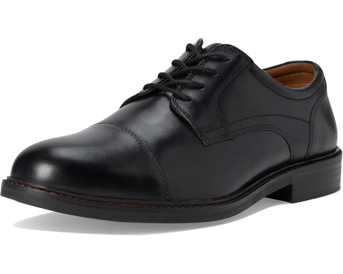 Black leather cap-toe oxford shoe with lace-up front and rubber sole edge.