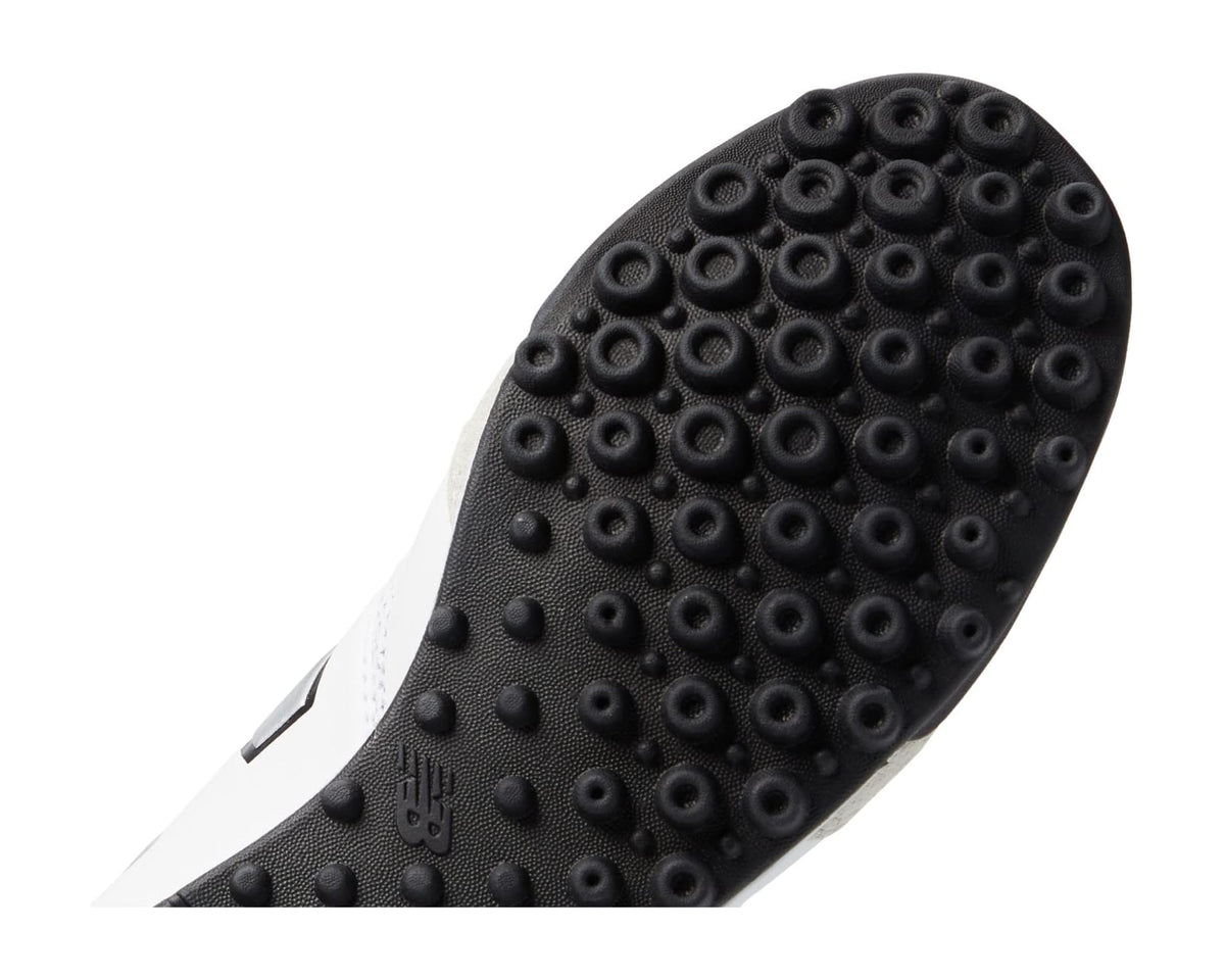 Men's black turf cleat outsole with studded rubber traction pattern