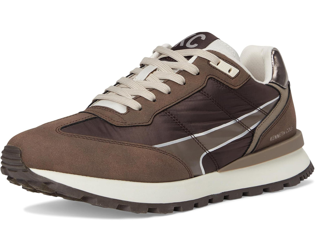 Front three-quarter view of dark brown sneaker with cream laces and side stripe