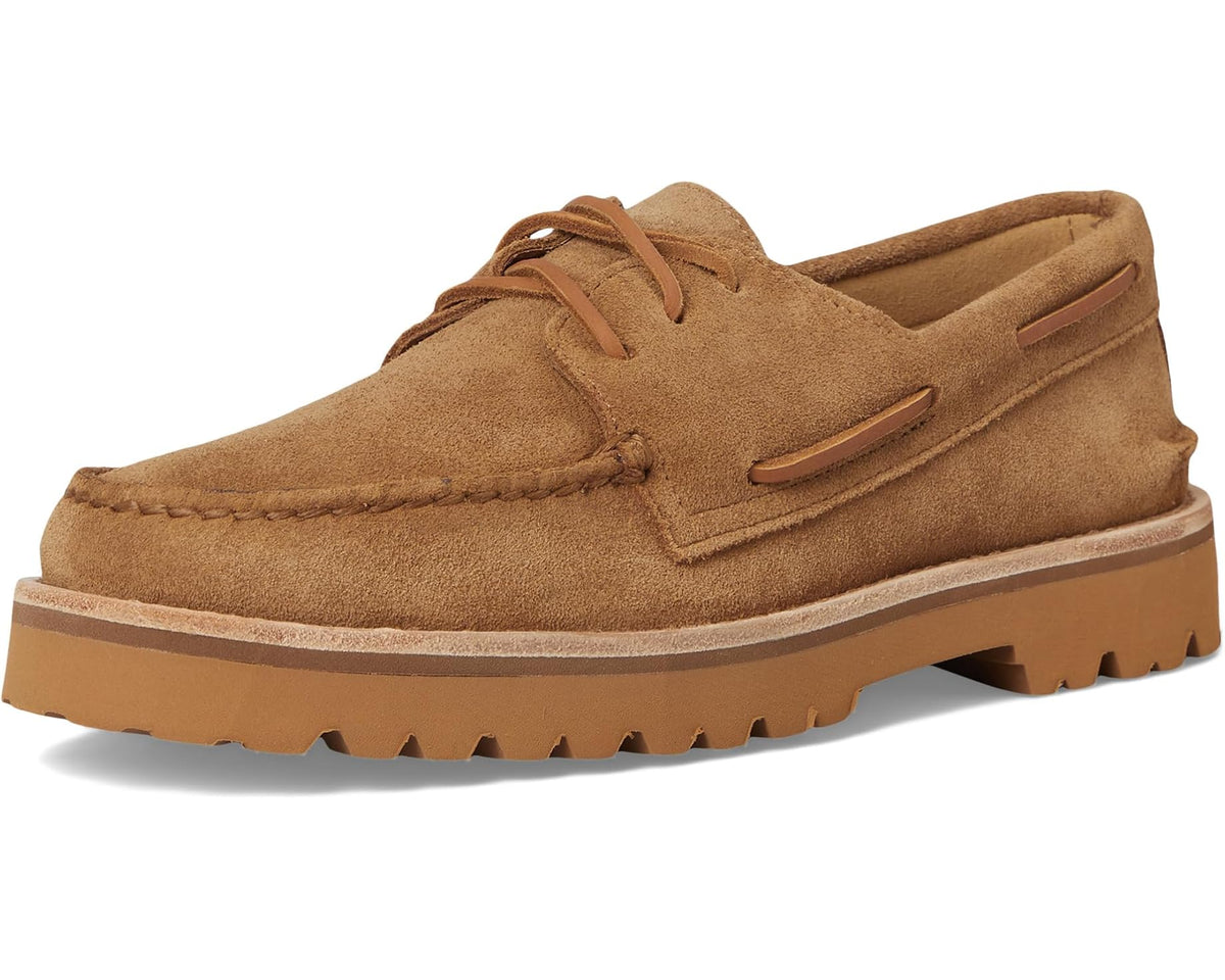 Tan suede lace-up boat shoe with side accent strap and lugged rubber sole