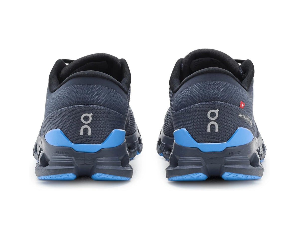 Heel view of On Cloud X 4 running shoes in navy with blue heel inserts