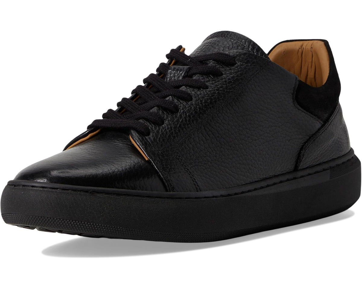Men's black leather lace-up sneakers with contrast orange stitching and cushioned sole