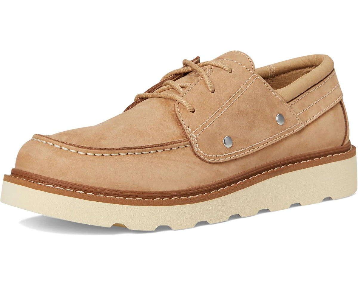 Front view of tan lace-up canoe moc shoe with rubber sole and metal eyelets