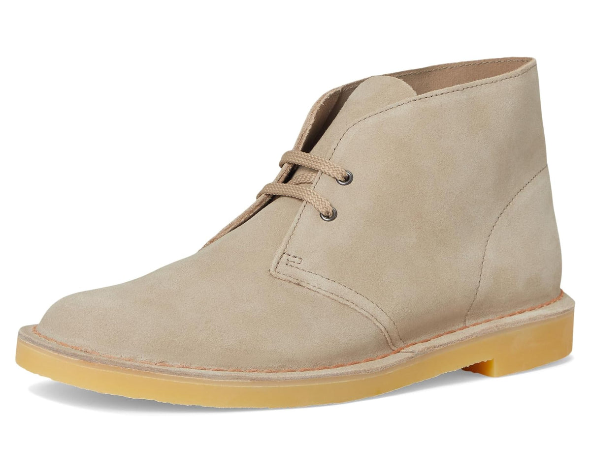 Sand suede lace-up desert boot with moc toe seam and contrast rubber sole.