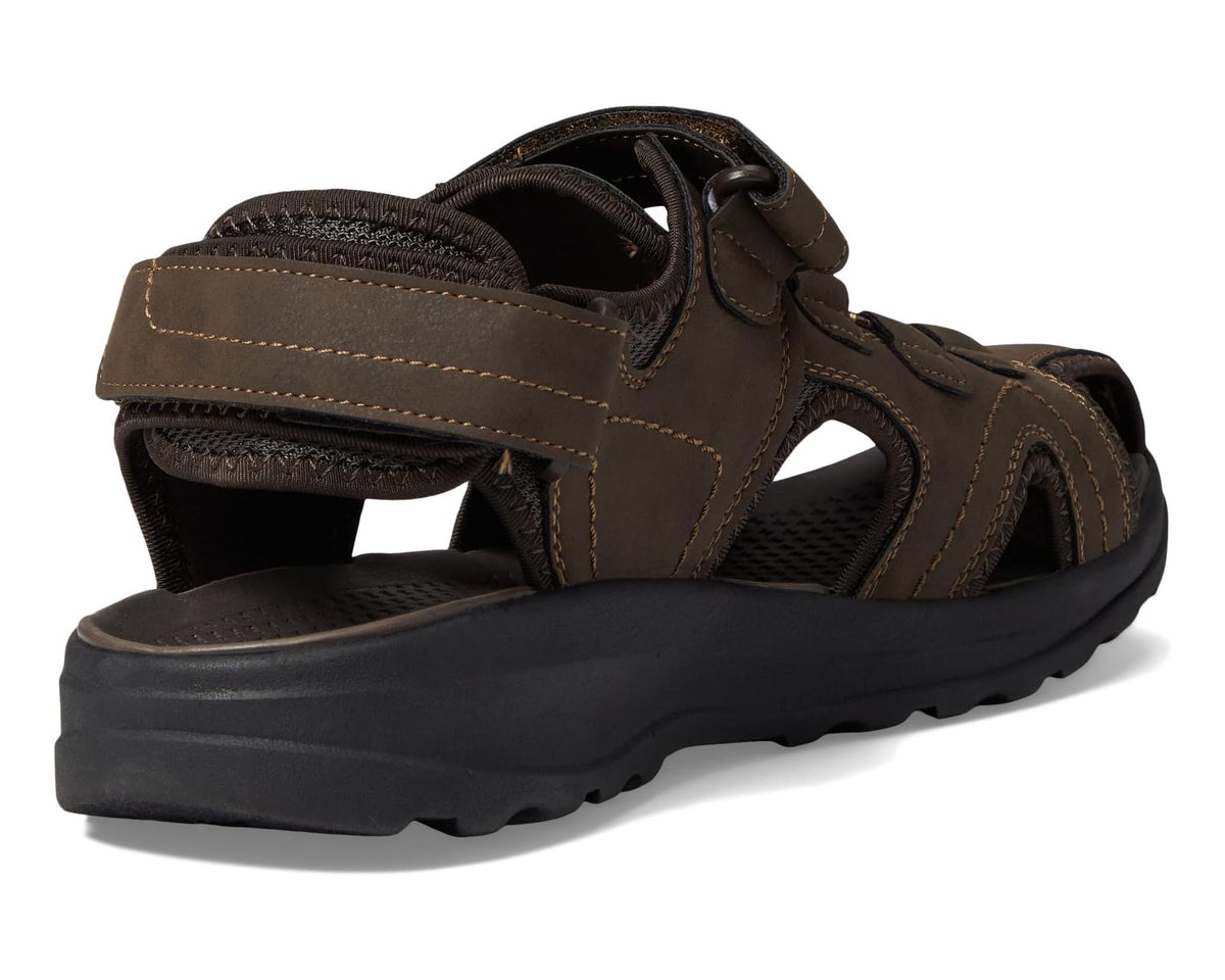 Brown closed-toe sandal side view with thick lug sole and adjustable straps