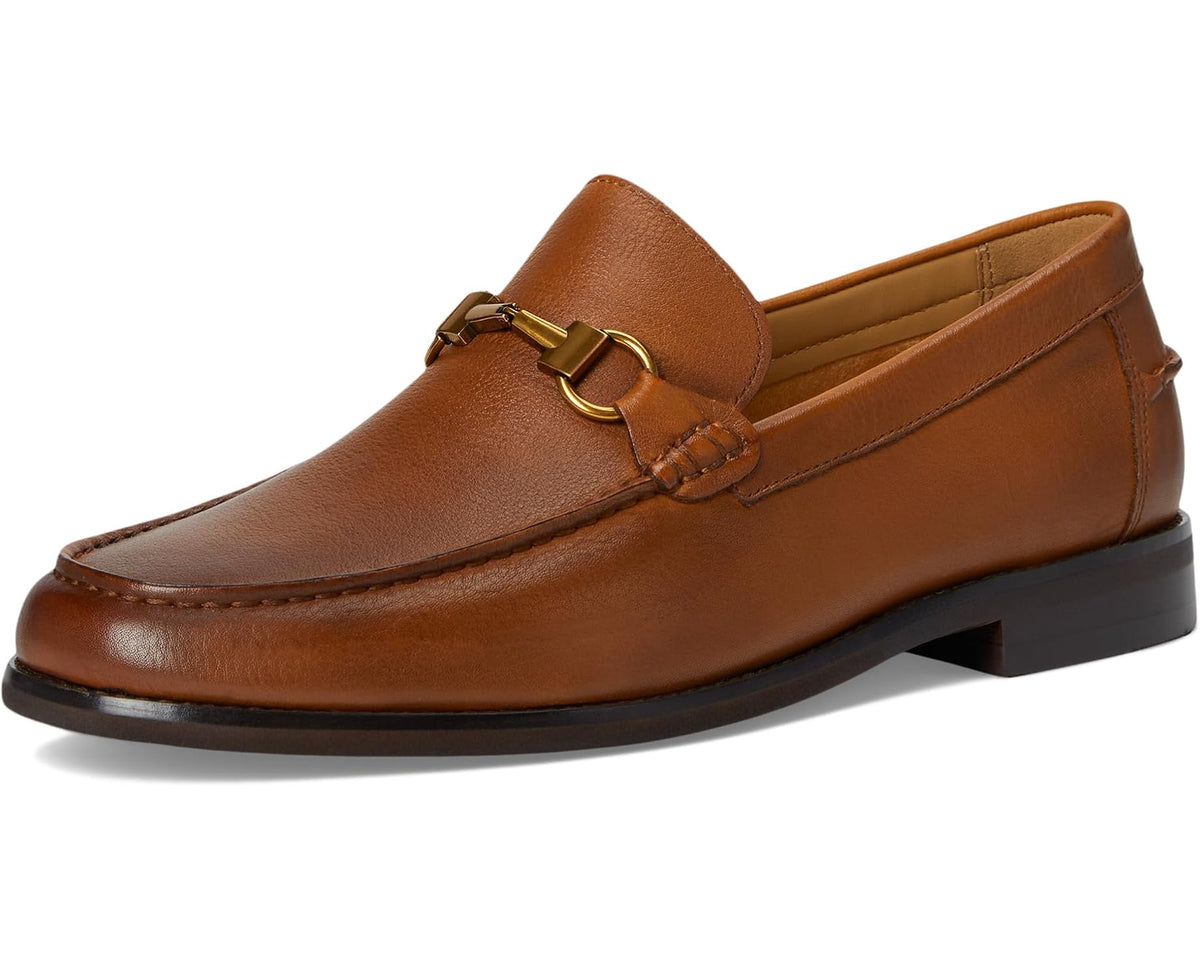 Tan leather loafer with gold buckle strap, clean moc stitching