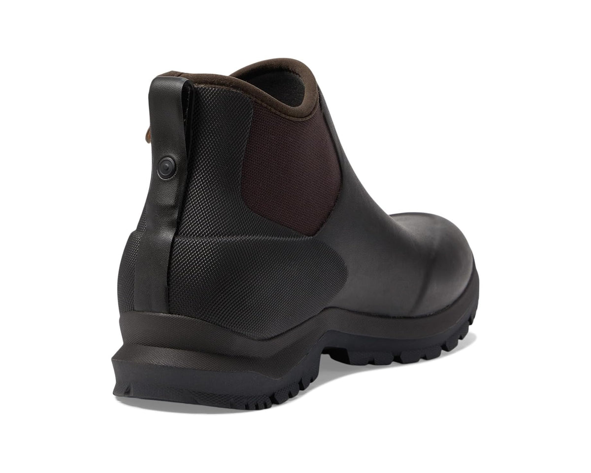 Chelsea boot back view with heel pull tab and dark brown tread sole