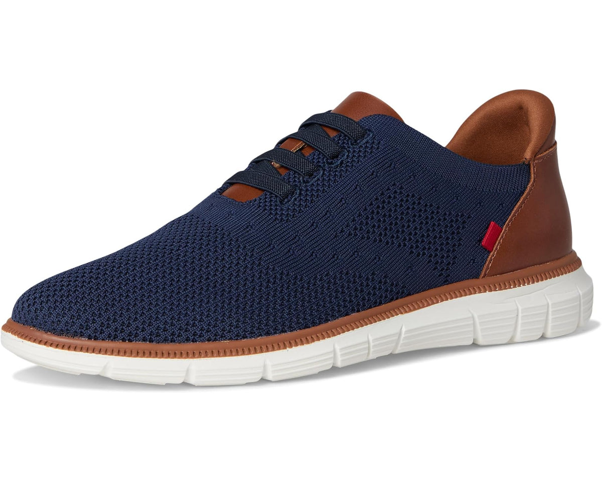 Navy knit lace-up sneakers with brown leather collar and white cushioned sole