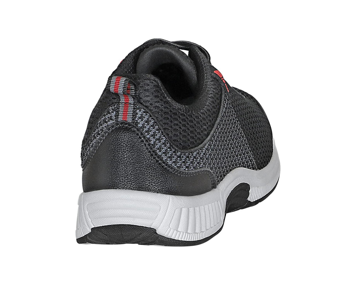 Black sneaker heel view with padded collar and white sole