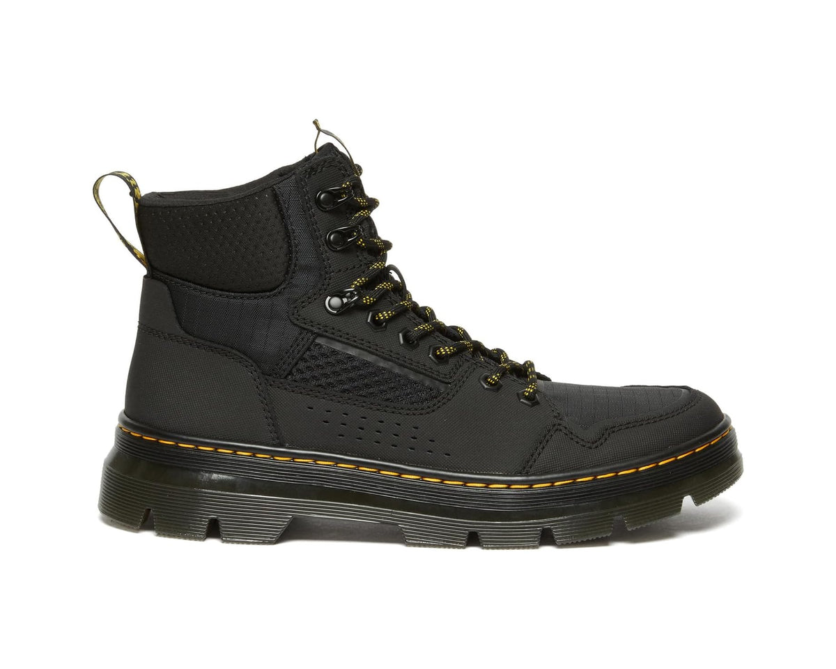 Black lace-up ankle boot with side panels, yellow laces and welt stitching