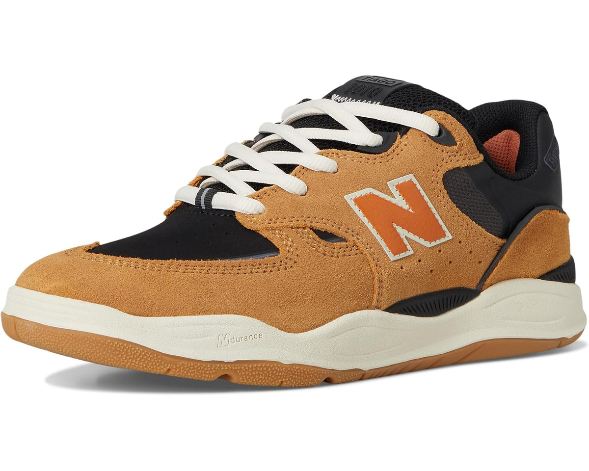 New Balance Numeric 1010 sneakers front three-quarter view, camel suede with black and orange