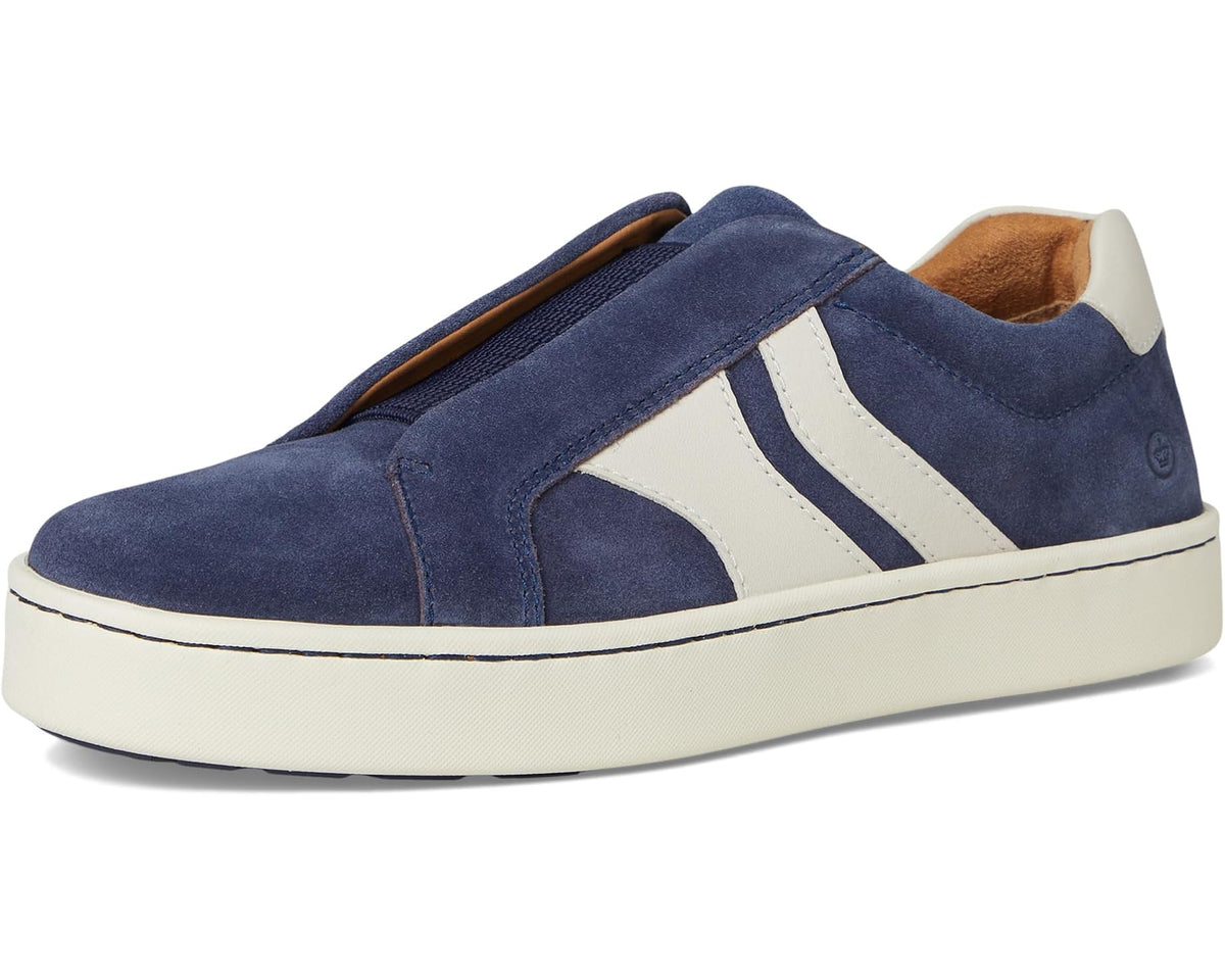 Navy suede slip-on sneakers with two white side stripes and cream sole