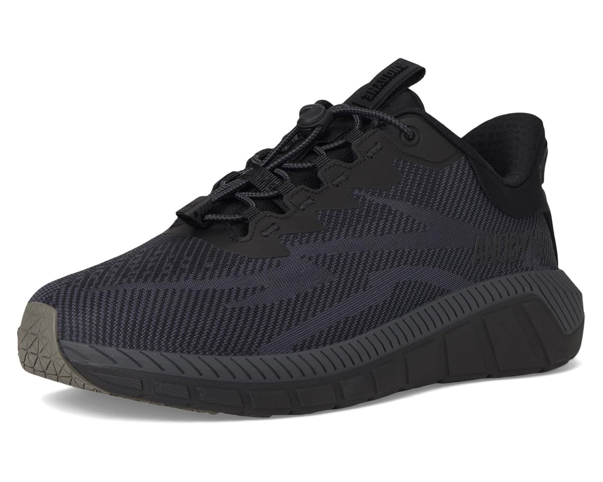 Anodyne men's black sport sneaker, angled front view with rugged outsole tread