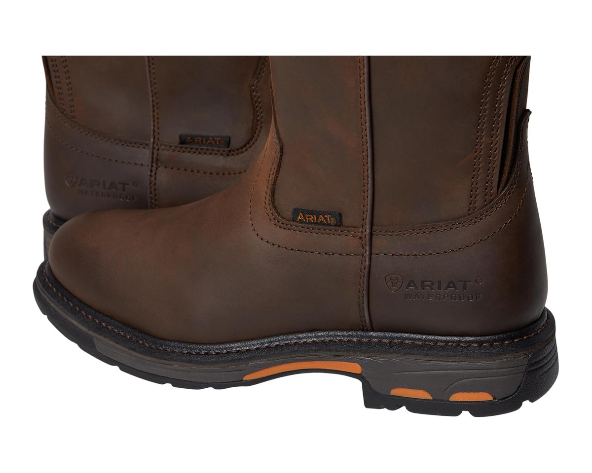 Close-up of brown leather pull-on work boot with Ariat logo and orange outsole