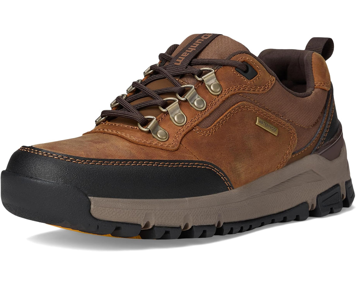 Front view of brown lace-up hiking shoe with rugged tread and cushioned sole