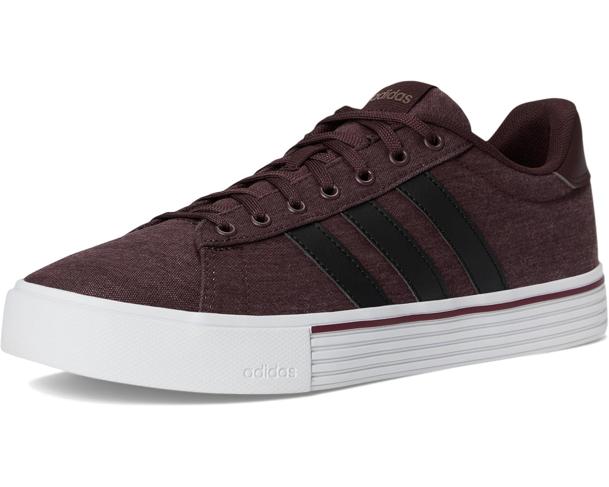 Unisex adidas low-top sneakers in dark brown with black three stripes and white sole