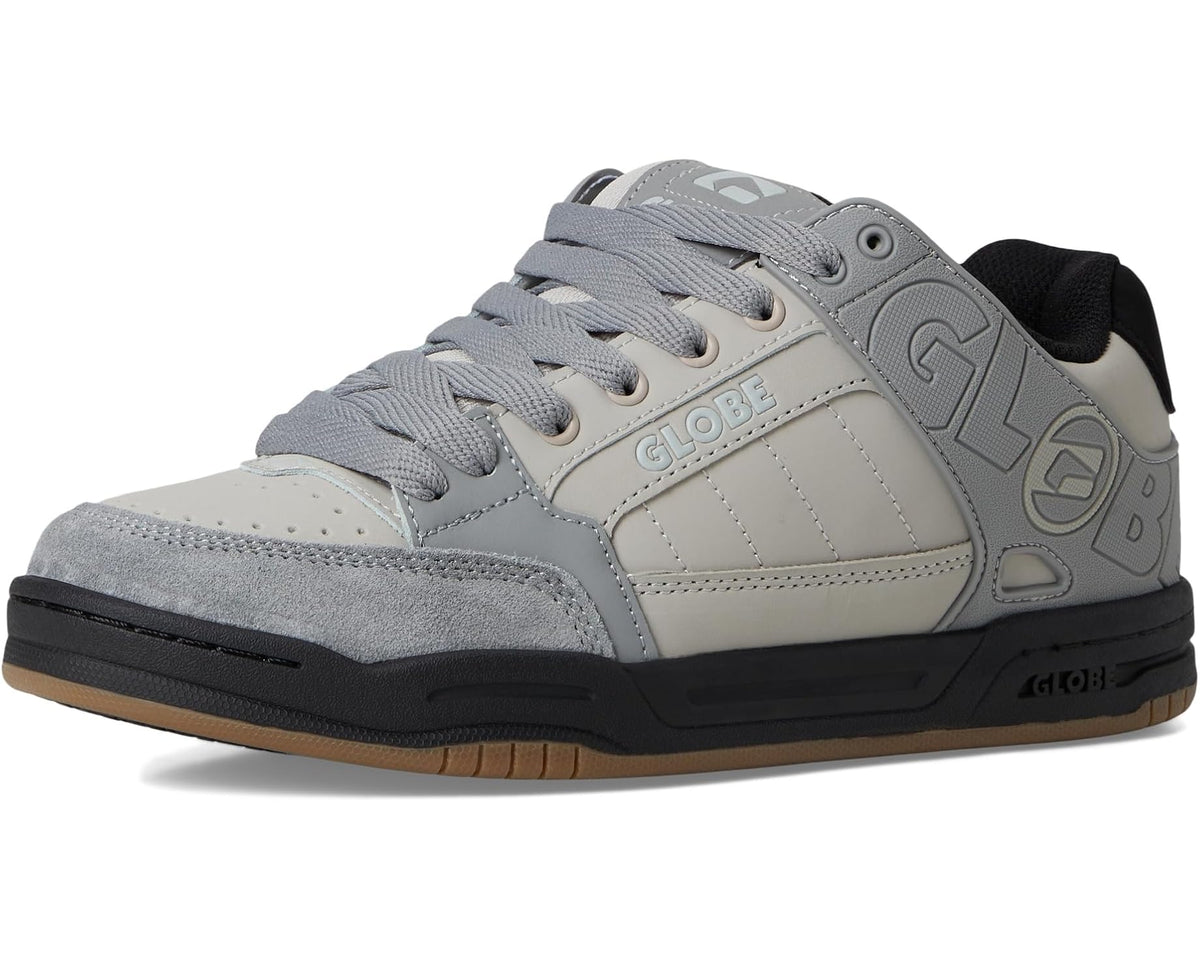 Low-top sneakers front angle with light gray laces, off-white leather, and black sole