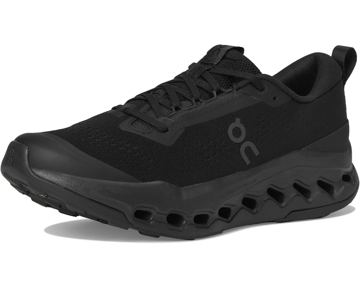 Men's black trail running shoe angled view with lace-up upper and traction outsole