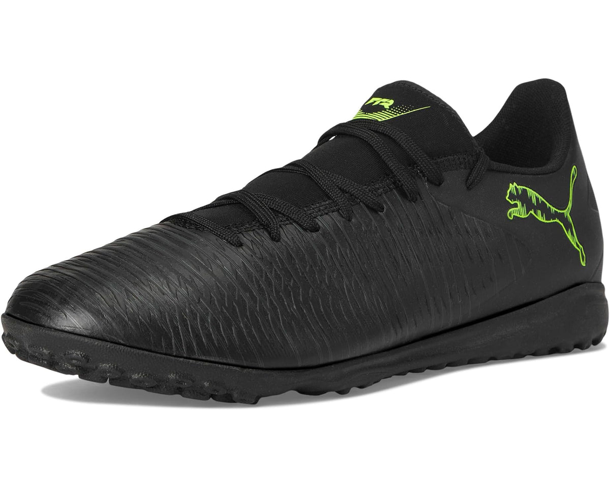 Men's PUMA turf trainer cleats in black with neon green accents and rubber turf sole