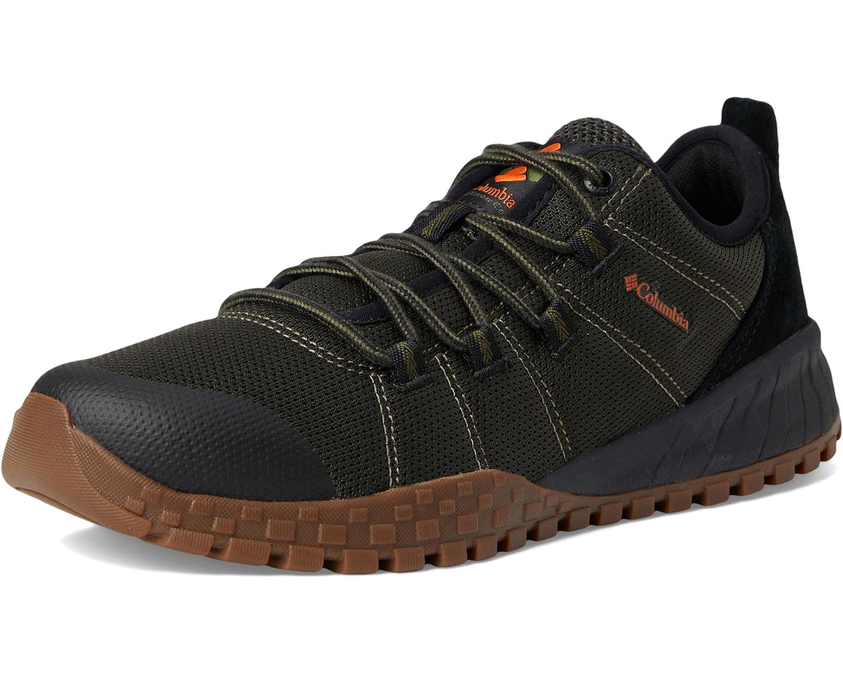 Men's low-top hiking shoe front view in dark olive with orange logo and brown tread sole