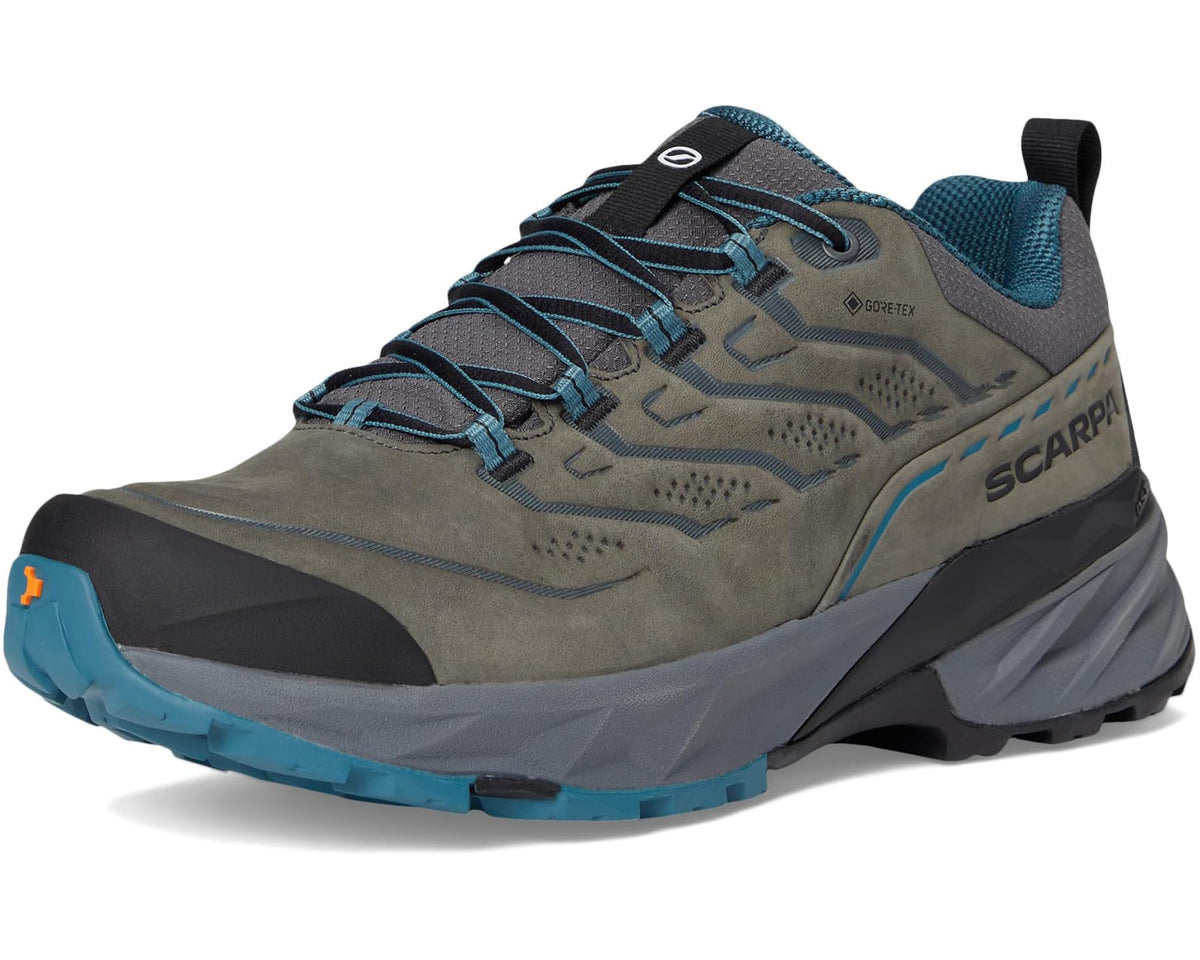 Men's hiking shoe three-quarter view with teal outsole and black toe bumper