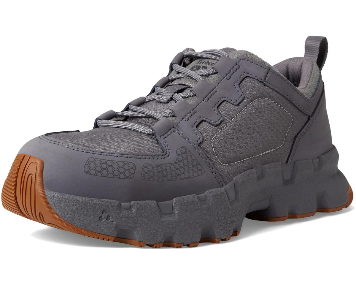 Medium grey lace-up work shoe pair with orange outsoles and textured side panels