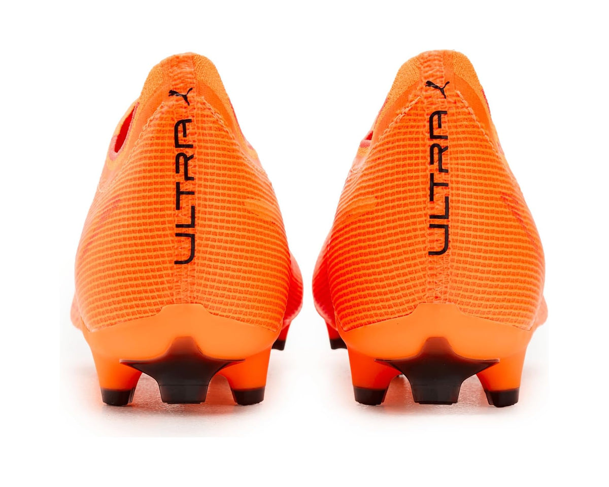 PUMA men's soccer cleats rear view, orange heels with ULTRA branding and studs