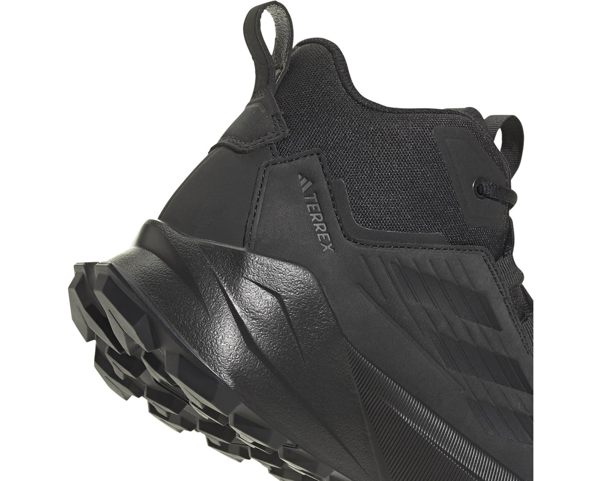 Men's hiking shoes side profile with adidas Terrex logo and rugged outsole