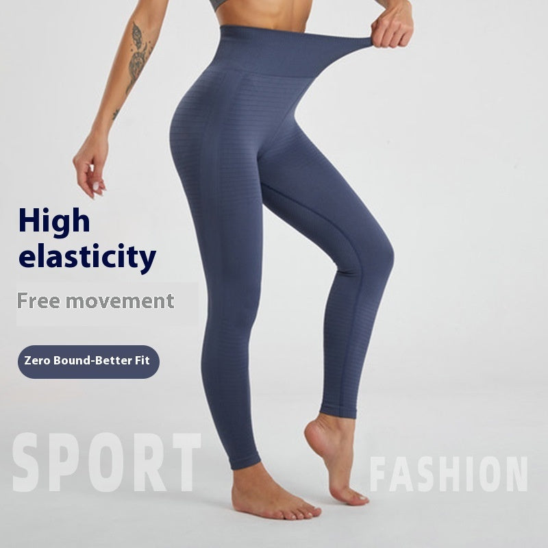 Women’s high-waist navy fitness leggings with textured fabric and full-length fit