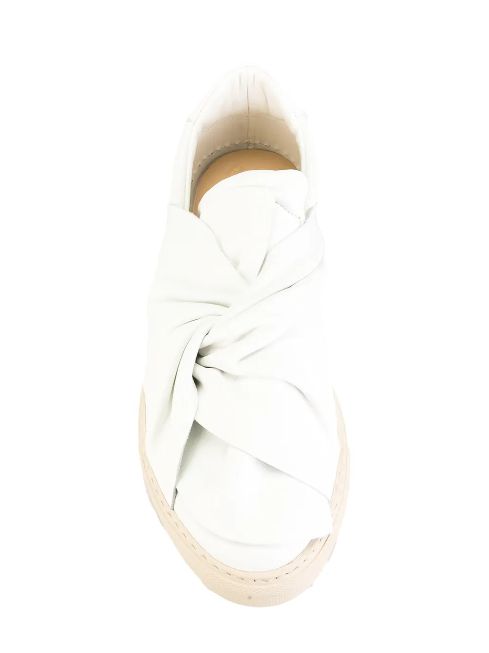 White knotted sneaker showing lace knot wrap and beige trim around sole